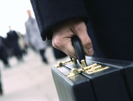 Businessman holding his briefcase